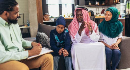 coaching Real estate agent discussing with a arab family who signs a contract for the purchase of an apartment.