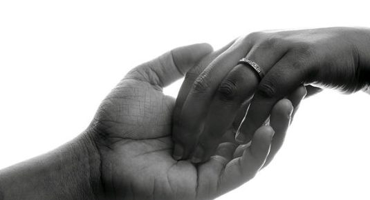 Soft gentle touch of man and woman.concept of love connection help.