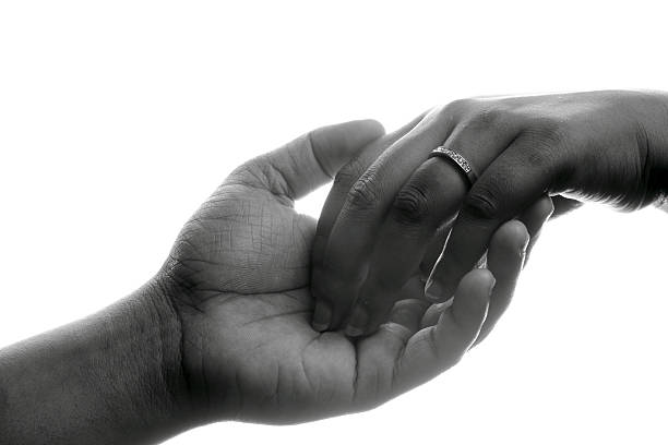 Soft gentle touch of man and woman.concept of love connection help. Soft gentle touch of man and woman.concept of love connection help.